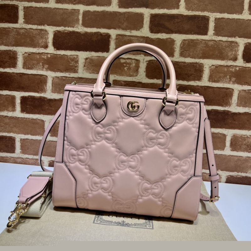 G*u*i top handle bags
